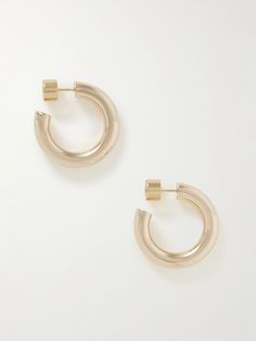 Jennifer Fisher's 'Natasha Huggies' earrings are made from gold-tone metal and have a chunky hoop profile that will go with any outfit. This pair is a model favorite, as spotted on Hailey Bieber and Emily Ratajkowski. Jennifer Fisher Jewelry, Jennifer Fisher, Emily Ratajkowski, Fashion Jewelry Earrings, Hailey Bieber, Huggies Earrings, Gold Tone Metal, Fashion Watches, Ear Piercings