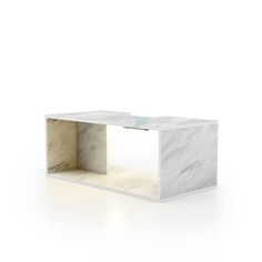 a white marble coffee table with an open shelf on the top and bottom, in front of a white background