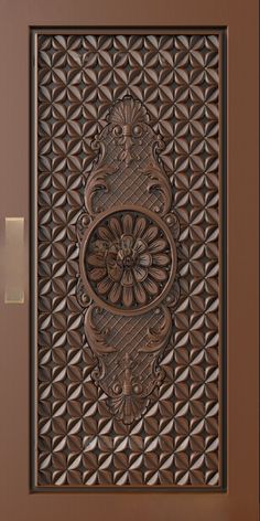 an intricately designed door is shown in this photo, with the light switch on