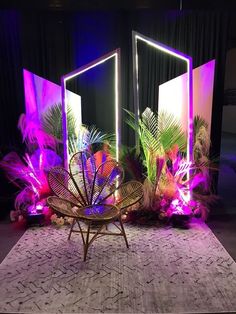 two mirrors with plants and lights in front of them