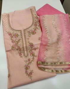 Item Overview ATHARVA Hand Embroidered Salwar Kameez in Light Peach w/ Hand Embroidered Neck/Gota Patti & Border Dupatta/Customized Stitching/Wedding/ Dno. CH Fabric: * Shirt Chanderi 2.5 Mts, Light Peach Jaal Embroidery * Dupatta: Pure Chiffon Chinnon Dupatta with Gota Patti work 2.5 Mts. * Bottom Santoon Silk 2.5 Mts. Excusive Hand Embroidered Party Wear Punjabi Suit. Customization: * Fabrics: Designs Can be made in different Fabrics. * Stitching Available Care: * Dry Clean/ Avoid direct Ironi Semi-stitched Pink Lawn Suit With Dabka Work, Pink Traditional Wear With Resham Embroidery In Dola Silk, Pink Chanderi Traditional Wear With Gota Work, Pink Dola Silk Sets With Gota Work, Pink Dabka Work Traditional Wear In Dola Silk, Pink Traditional Wear With Dabka Work In Dola Silk, Pink Anarkali Traditional Wear In Chinon, Pink Dola Silk Traditional Wear With Dabka Work, Pink Chanderi Designer Traditional Wear