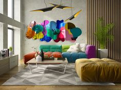 a living room filled with lots of furniture and colorful art hanging on the wall above it