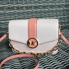 Michael Kors Carmen Small Monogram Flap Crossbody Sherbert Color Color: Sherbert Vegan Leather Gold-Tone Hardware Chain Handle Detachable Adjustable Leather Crossbody Strap Flap With Magnetic Snap Button Closure Interior Features: 2 Departments, 2 Wall Pockets 7.3/4"W X 5.1/2"H X 2"D Luxury Bags Collection, Small Shoulder Bags, Chloe Faye, Wall Pockets, Crossbody Strap, Beautiful Words, Snap Button, Leather Crossbody, Luxury Bags