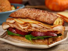 a sandwich sitting on top of a white plate