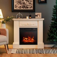 a living room with a christmas tree and a fire place in the middle of it