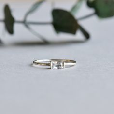 >Eye-catching baguette accents this silver ring. >925 sterling silver hallmarked >Sterling silver is an almost pure metal made from 92.5% Silver. >Approx. 1mm band width; 3mm x 5mm cubic zirconia. Rose Gold Vermeil: https://www.etsy.com/listing/616359482/14k-rose-gold-vermeil-ring-baguette-ring?ref=shop_home_active_13 FREE SHIPPING USA- All of our jewelry will arrive in custom packaging ready for gift giving. CARE: To prolong the color and shine of your jewelry, avoid contact with pe Modern Silver Rings With Baguette Diamonds, Silver Rings With Baguette Diamonds, Emerald Cut, Silver Emerald Cut Baguette Diamond Rings, Classic Sterling Silver Rings With Baguette Diamonds, White Gold Sterling Silver Rings With Baguette Diamonds, Silver Rectangular Rings With Baguette Diamonds, Silver Emerald Cut Stackable Rings Fine Jewelry, Silver Emerald Cut Everyday Rings, Everyday Silver Jewelry With Emerald Cut