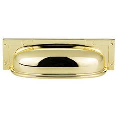 a gold door handle on a white background