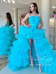 This stylish and modern prom dress features a high-low silhouette, a ruffled bodice and tiered tulle in a gorgeous turquoise shade, perfect for making an unforgettable statement. The sleek design and voluminous layers will flatter any figure, for a timeless look that never goes out of style. It can be made in other colors,please contact us 1.Silhouette: A Line 2.Fabric: Tulle 3.Embellishment: None 4.Neckline: Straight Neck 5.Sleeve: Sleeveless 6.Waistline: Natural 7.Hem-length: Sweep Train 8.Bac Modern Prom Dresses, High Low Ball Gown, High Low Prom Dress, Strapless Party Dress, High Low Prom Dresses, Simple Prom Dress, Marine Uniform, Evening Party Gowns, Blue Evening Dresses