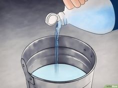 a person pouring water into a bucket