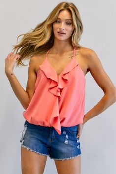 The solid V-neck sleeveless ruffle top is a chic and feminine addition to any wardrobe. Its flattering V-neck design adds a touch of sophistication, while the ruffle detailing brings a playful and trendy element to the garment. Whether dressed up with slacks or paired with jeans for a casual look, this top is a versatile choice for both day and evening wear.Model is wearing a size smallHeight: 5'9"Bust: 32BWaist: 24"Hips: 34" Style: Casual Print / Pattern: Solid Silhouette: Loose Fit Fit: Loose Barbiecore Outfit, Timeless Outfits, Ruffle Tank Top, Loungewear Luxury, Pink M, Outfit Aesthetic, Best Jeans, Solid Tops, Ruffle Top