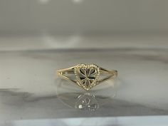 14kt yellow gold ring, weighs .8dwt, is 7mm at its widest point and is currently a size 5.75 but can be resized! Valentine's Day 14k Yellow Gold Diamond Ring, 14k Gold Heart Ring With Diamond Cut For Promise, 14k Yellow Gold Heart Ring, 14k Yellow Gold Heart Ring With Vvs Clarity, Heart-shaped Yellow Gold Rings For Formal Occasions, Formal Yellow Gold Heart Ring Stamped 14k, 14k Gold Heart Cut Ring For Formal Occasions, Formal 14k Gold Heart Cut Ring, Formal 14k Gold Heart Ring