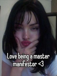 a woman with her hand on her face and the words love being a master manifestor