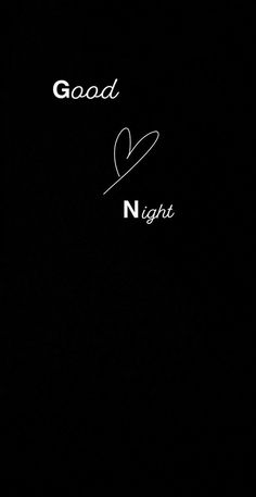 the words good and night are written in cursive writing on a black background