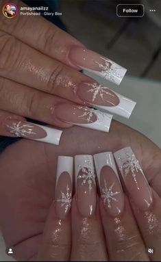 How about elegant white and silver snowflake designs or a classic white French manicure with a touch of holiday sparkle? It combines timeless elegance with a touch of winter magic. #snowflake#christmas#nails#naildesign#nailideas #christmasideas #frenchnails #white#manicure#holiday#elegant