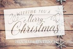 a wooden sign that says wishing you a merry christmas