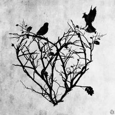 two birds sitting on top of a tree branch in the shape of a heart with leaves