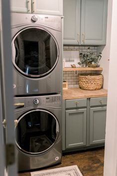 a washer and dryer in a small kitchen