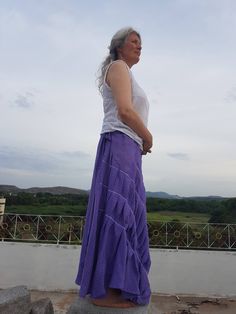 "Unique Skirt / Long Flowy Skirt / Bocho Skirt / Long Skirt / Linen Skirt / Violet Skirt / Womens Long Skirt / Womens Skirt / Skirt This long flow skirt is high quality handmade linen clothing. The length of linen skirt can be different. It is gentle, accurate and high quality work. Handmade from linen fabric. All linen clothes for women and man made to order special for You and Your dimensions. Plus size clothing is available. The wholesomeness of the landscape and the vast expanse of nature th Casual Asymmetrical Maxi Skirt With Gathered Detail, Casual Asymmetrical Gathered Maxi Skirt, Casual Purple Midi Skirt, Purple Asymmetrical Skirt For Summer, Casual Purple Flared Maxi Skirt, Cotton Flowy Wrap Skirt, Long Ruffled Skirt In Purple, Purple Cotton Beach Skirt, Casual Purple Flared Skirt