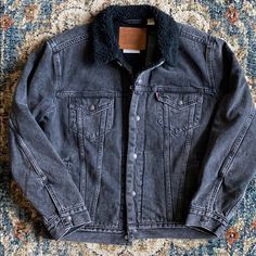 Brand New And Unworn, Levis Sherpa Trucker Jacket, Size Medium. Long Sleeve Denim Jacket With Fleece Lining For Fall, Fall Denim Jacket With Fleece Lining And Long Sleeves, Levi's Fitted Outerwear For Cold Weather, Fall Denim Jacket With Fleece Lining, Classic Black Denim Jacket For Winter, Vintage Black Outerwear For Cold Weather, Vintage Levi's Outerwear For Winter, Levi's Long Sleeve Outerwear For Cold Weather, Levi's Black Denim Jacket For Winter