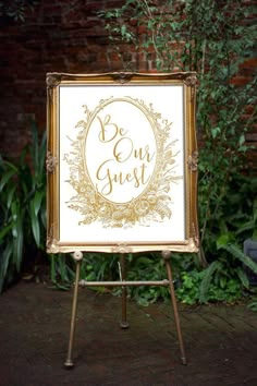 an easel with a sign on it that says return to the wedding of david and kate