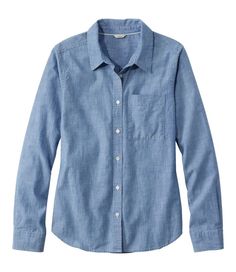 Amazingly soft and light, our most versatile cotton chambray shirt looks great on its own or layered. With an easy fit to always feel comfortable. Falls at low hip. Relaxed Fit: Our most generous fit sits farthest from the body. 100% cotton indigo chambray. Machine wash and dry. Button-front placket and buttoned cuffs. Slightly curved hem. Single chest pocket. Imported. Fit: Relaxed Fit | Women's Essential Cotton Shirt, Chambray Long Sleeve Womens Chambray Shirt, Blue Work Shirt, Core Wardrobe, Farm Clothes, Chic Jeans, Women's Button Down Shirt, Chambray Top, Women Essentials, Chambray Shirt