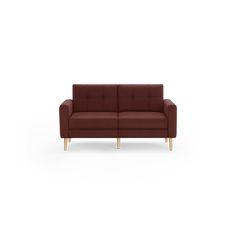 a red couch sitting on top of a white floor next to a wooden leg chair