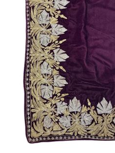 Complement your outfit with this Royal Velvet Cape. This is a very easy to style cape and it can be paired with any top, blouse, dress, or any other thing, no doubt you'll stand out from the crowd.Product DetailsCondition Brand New Velvet Cape with Golden & Silver Fusion Kashmir Zari Embroidery.Colour: PurpleSize: 82" X 35" (208.28 cms X 88.9 cms) approx.If you want a bigger or smaller size (dimensions), we can make it for you on order, just drop us a message.Care Instructions- Dry Clean Onl Gold Saree With Embroidered Border For Reception, Purple Traditional Wear With Embroidered Border For Wedding, Purple Embroidered Fabric With Border For Wedding, Purple Wedding Embroidered Fabric With Embroidered Border, Purple Embroidered Wedding Dupatta, Purple Embroidered Border Dupatta For Wedding, Wedding Shawl With Multicolor Embroidery, Festive Floral Embroidered Shawl For Wedding, Festive Wedding Shawl With Floral Embroidery