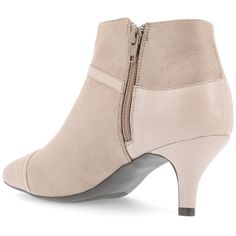 Introducing Embrie, the chic and minimalistic bootie from Journee Collection that will give your dressed-up fall look the finishing touch it needs. Made from vegan leather with two-tone accents, Embrie features an easy-to-use zipper entry, pointed-toe, and 2 1/2-in stiletto heel, making it perfect for any special occasion. With a 4 mm Tru Comfort Foam™ insole, Embrie ensures comfort all day long, so you can look great and feel fabulous. Taupe Ankle-high Boots With Medium Width, Taupe Ankle-high Boots Medium Width, Taupe Ankle Boots For Fall, Beige Faux Leather Boots For Work, Taupe Ankle Boots Medium Width, Taupe Ankle Boots For Spring, Spring Faux Leather Booties For Work, Spring Taupe Ankle Boots, Beige Booties For Work In Fall