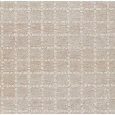 a beige and white rug with squares on it