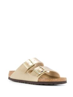 Shop gold Birkenstock Arizona buckled sandals with Express Delivery - Farfetch Womens Sandals Birkenstock Cristal, Gold Buckle Birkenstocks, Birkenstock Metallic, Black And Gold Birkenstocks, Birkenstock Arizona Rose Gold, Espadrilles Slides, Birkenstock Sandals Arizona, Birkenstock Sandals, Black Friday Promotions