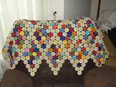 there is a couch covered with buttons on it