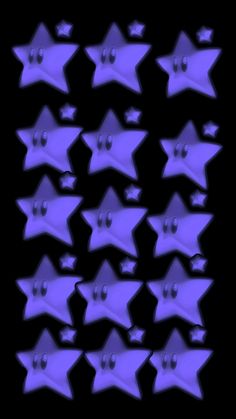 a group of star shaped objects in the dark