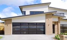 a two story house with an attached garage