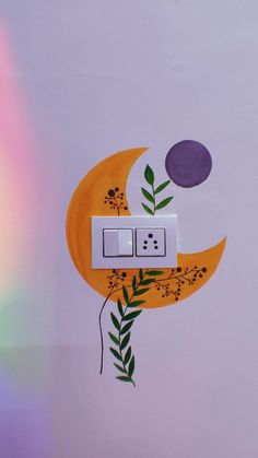 the light switch is decorated with flowers and leaves on it's side, next to a rainbow - hued wall