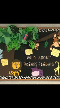 a bulletin board with animals and plants on it