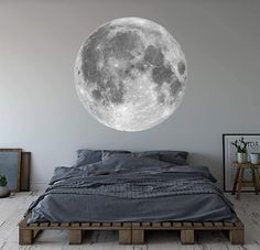 a full moon wall sticker in a bedroom