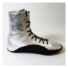 "Custom made Tightwire Boots in Silver metallic leather upper with Black Sole Fitted with hard-wearing suede soles, which curve high on either side of the foot for protection and comfort on the tightwire -Made to your foot measurements  -Leather Lining & insole -Black heavy duty Suede Sole  -Silver eyelets -choice of Silver or Black laces -Height of boots 7\" inches (18cm) from floor to top edge Sizes are shown in UK size - for the international shoe size chart please CLICK HERE. Please contact Boots Suede, Shoe Size Chart, Black Laces, Metallic Leather, Shoes Black, Circus, Mars, Black Shoes, Metallic Silver