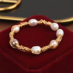 * Buy 2 baroque pearl bracelets and receive a free jewelry organizer * Buy more than 2 baroque pearl bracelets to receive a $10 discount and a free mirror jewelry organizer Baroque Freshwater Real Dainty Baroque Pearl Bracelet Gold Design | Girls Pearl Bracelet| Pearl And Gold Bracelet For Weddings 14K gold baroque pearl bracelet, available in four beautiful colors; pink, white, grey and black and green. Add a touch of elegance to any outfit with our collection of classic and handmade baroque pe Rose Gold Bangle Pearl Bracelet As A Gift, Baroque Pearl Bracelet Jewelry Gift, Gold Baroque Pearl Jewelry, Wire Wrapped, Baroque Pearl Wire Wrapped Jewelry Gift, Gold Baroque Pearl Bracelet For Gift, Rose Gold Pearl Bracelet As Gift, Handmade Rose Gold Pearl Bracelet Gift, Gift Gold Baroque Pearl Bracelet, Wire Wrapped Pearl Bracelet Gift