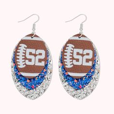 [UNIQUE DESIGN]: Customize your player's jersey number with these lightweight chunky sequin and faux leather earrings. The brown leather front layer, which is close to the football, and the flashing sequins (which can correspond to the colors of the supporting teams) are all unique designs that make people shine. [EXCLUSIVELY MADE]: Stainless steel ear hooks, a pendant made of PU material, fashion style, worn during rugby games to cheer for favorite players. [PERFECT GIFT]: Makes the perfect gif Number Earrings, Rugby Games, Big Statement Earrings, Football Earrings, Diy Leather Earrings, Mom Accessories, Football Lover, Perfect Gif