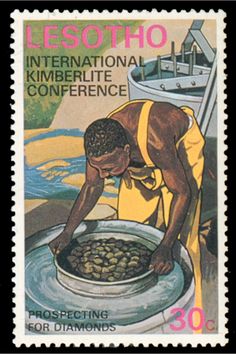 a stamp with an image of a man in yellow and white clothing holding a bowl