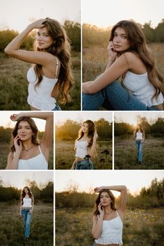 a woman in white shirt and blue jeans talking on cell phone while standing in field