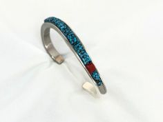 "Sterling Silver, Natural Kingman Black Web and Mediterranean Coral Inlay Bracelet.  5 5/8\" with 1\" opening This is a handmade, one-of-a-kind piece of art." Bracelets Easy, Turquoise And Coral, Diy Bracelets Easy, Kingman Turquoise, Phoenix Az, Turquoise Sterling Silver, Diy Bracelets, Turquoise Bracelet, Favorite Jewelry