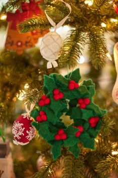 a christmas tree with ornaments hanging from it