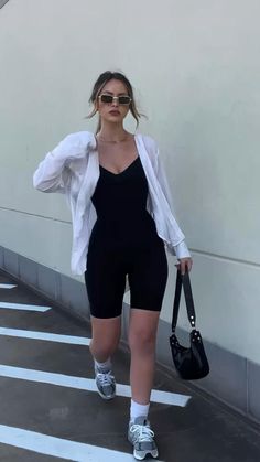 All White Workout Outfit, Trainers Women Outfit Summer, Biker Short Jumpsuit Outfit, Bike Shorts Romper Outfit, Sport Romper Outfit, Black Athleisure Outfits Summer, Chill Athletic Outfits, Aritzia Jumpsuit Outfit Shorts, Black Romper Shorts Outfit