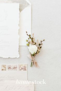 the wedding stationery is laid out and ready to be used