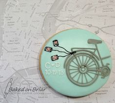 a decorated cookie with a bike on it