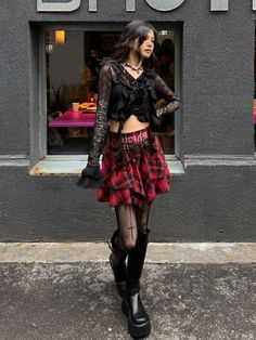 Embrace the Y2K fashion trend with this edgy and unique punk plaid skirt. Featuring a high-waisted A-line silhouette and an irregular hem, this skirt exudes a cool and alternative vibe. Perfect for the summer season, this standout piece is a must-have for those who love to express their individual style.  Please note that this product includes only the skirt or a set.  Garment Size   	 		 			Size 			S 			M 			L 		 		 			Waist 			63 			67 			71 		 		 			Full Length 			35 			36 			37 Gothic Fitted Skirt For Streetwear, Gothic Fitted Mini Skirt For Streetwear, Edgy Plaid Mini Skirt, Edgy Mini Skirt For Streetwear, Fitted Emo Mini Skirt For Summer, High Waist Grunge Skirt For Fall, High-waist Grunge Skirt For Fall, Emo Skirt For Alternative Fashion, Fitted Grunge Skirt For Alternative Fashion