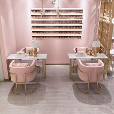 a nail salon with pink chairs and manicures on the tables in front of a mirror