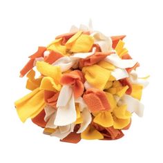 the letter b is made up of orange, white and yellow fabric flowers on top of each other