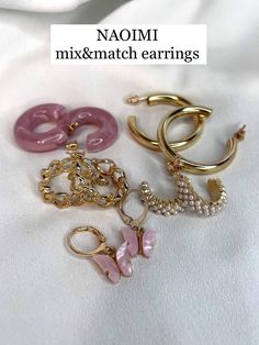 Set of 5 pairs pearl heart resin earrings for women in gold color. Elegant dangle boho style earrings are perfect for any occasion. Wether it is a summer beach party, birthday, evening date, it will complete your total look beautifully. If you want to make happy your loved one, then you found a perfect gift. Material: High quality zinc alloy.  ✦ SHIPPING & PACKAGING ✦ Each product packed in a very cute packaging 🎁 The items will be send 1-2 working days after payment. The package will be send f Chic Small Hoop Pink Jewelry, Chic Pink Small Hoop Earrings, Chic Small Pink Hoop Earrings, Chic Small Pink Hoop Jewelry, Trendy Pink Gold Plated Jewelry, Trendy Pink Gold-plated Jewelry, Chic Pink Hoop Jewelry, Dainty Pink Hoop Earrings, Feminine Metal Earrings